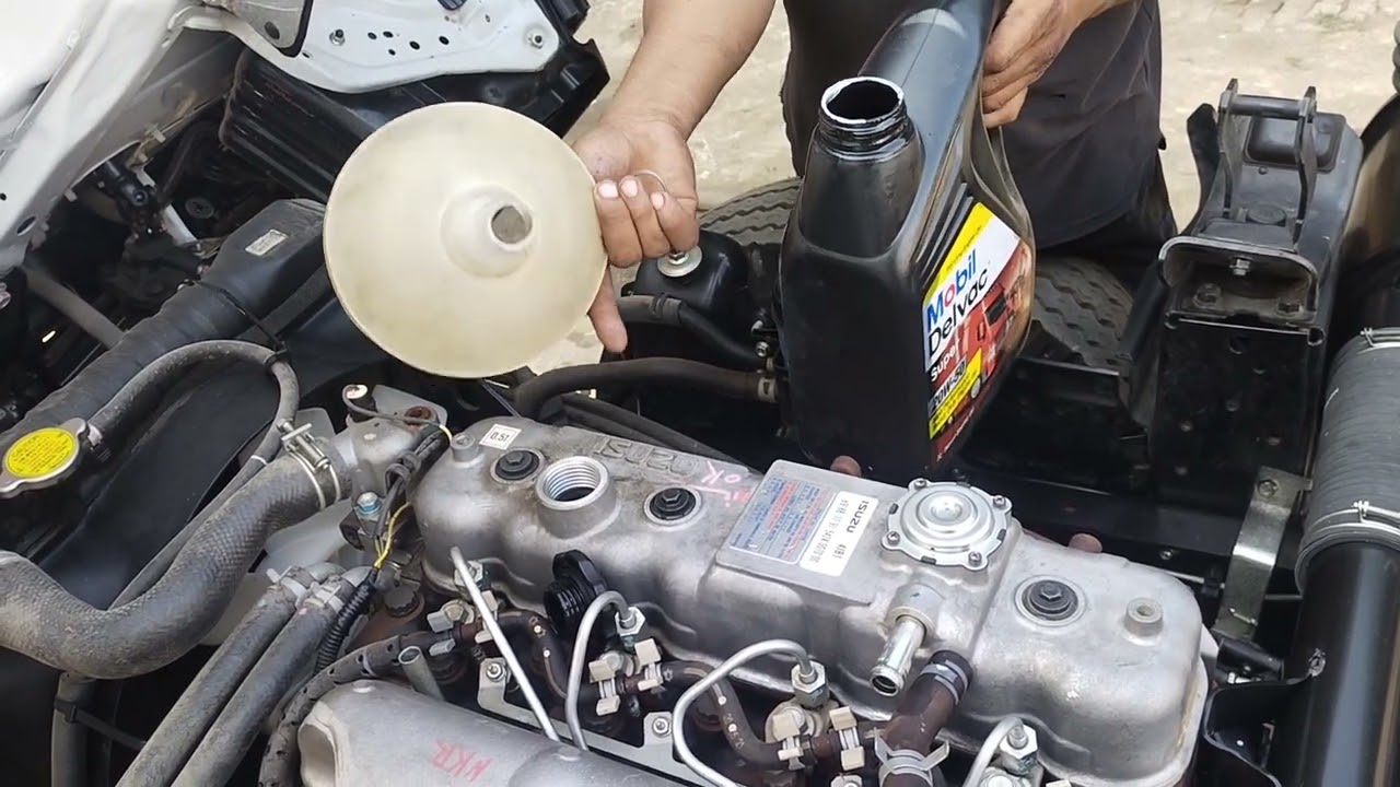 Isuzu nkr oil change and starting problem check
