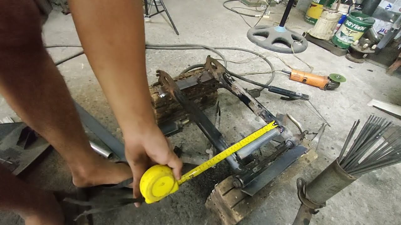 Swing arm repair Rusi TC 125.
