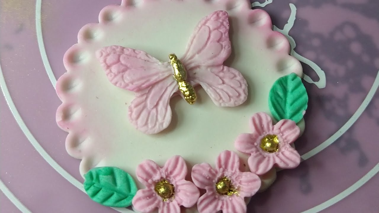 Decoração em pasta americana tema jardim , decoração cupcake ou decoração de pirulito .
