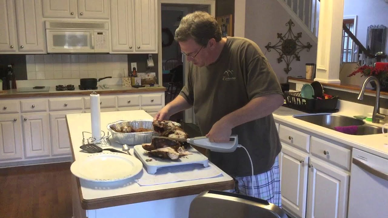 Carving a turkey with electric knife