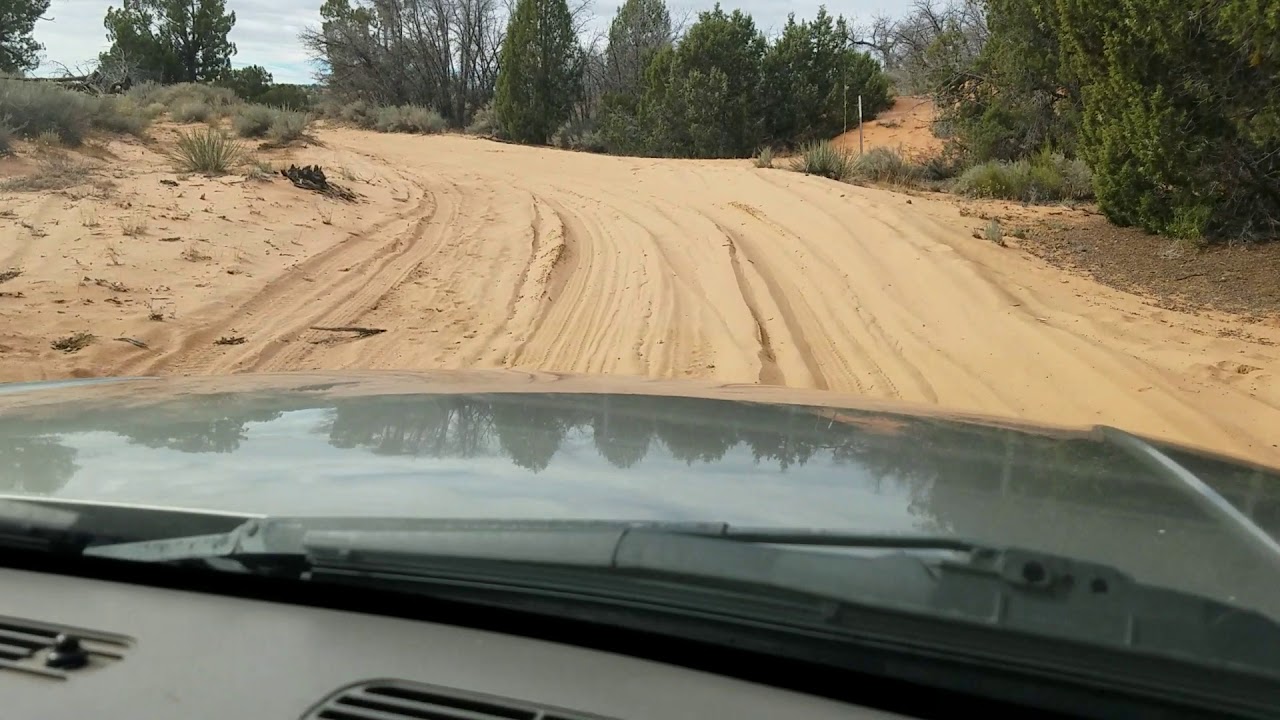 Driving thru the deep sand leaving Peekaboo Canyon Kanab Utah