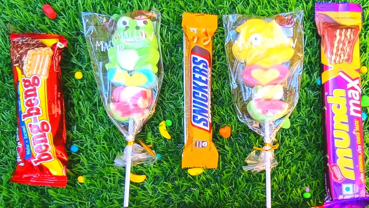 Asmr most popular Candies | rainbow lolipops and chocolate unpacking | eating popular Candies
