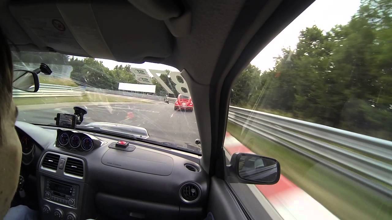 Subaru STI chasing beetle on Nordschleife