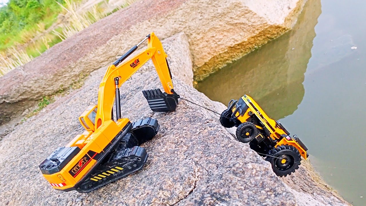 ALT tractor falling on lake rescued volvo excavator rescue video don't skip video, look at me...