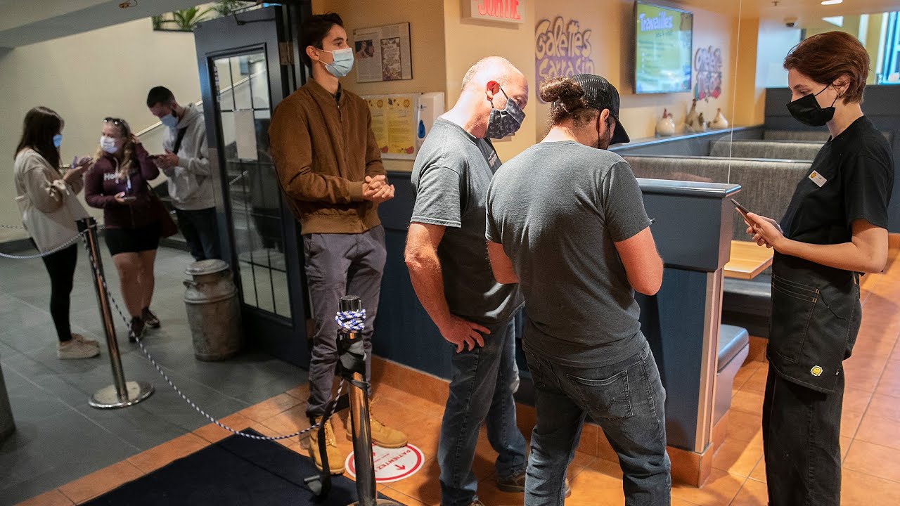 Montreal businesses and customers still adjusting on first day of Quebec's vaccine passport