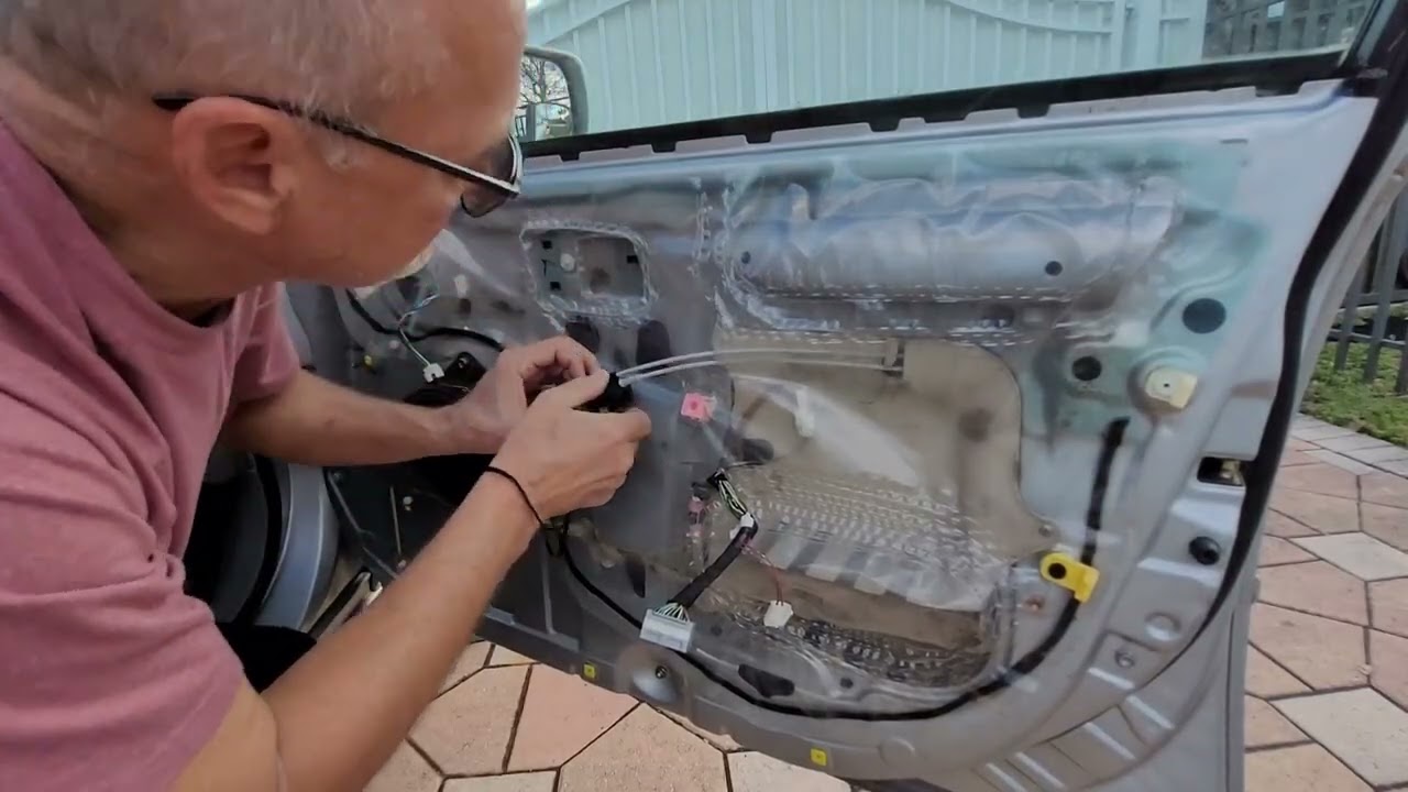 Toyota Avalon door handle.  Cambio de la manigueta del pasajero 