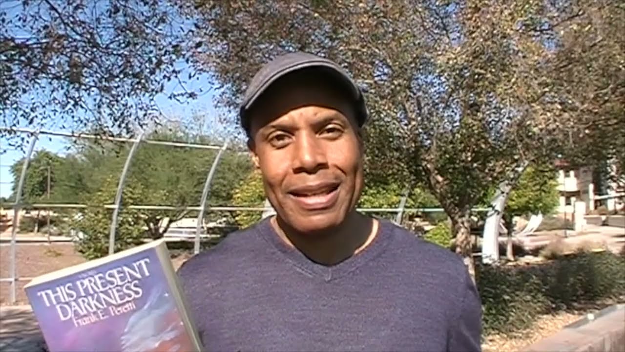 This Present Darkness and Piercing the Darkness by Frank E. Peretti