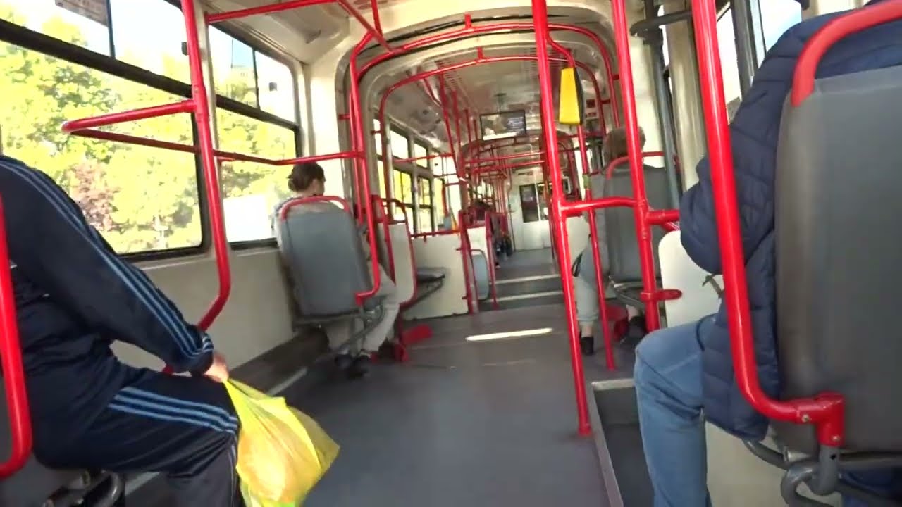 A bright red tram URAC V3A-93-CH-PPC № 4036 Bucharest Romania.