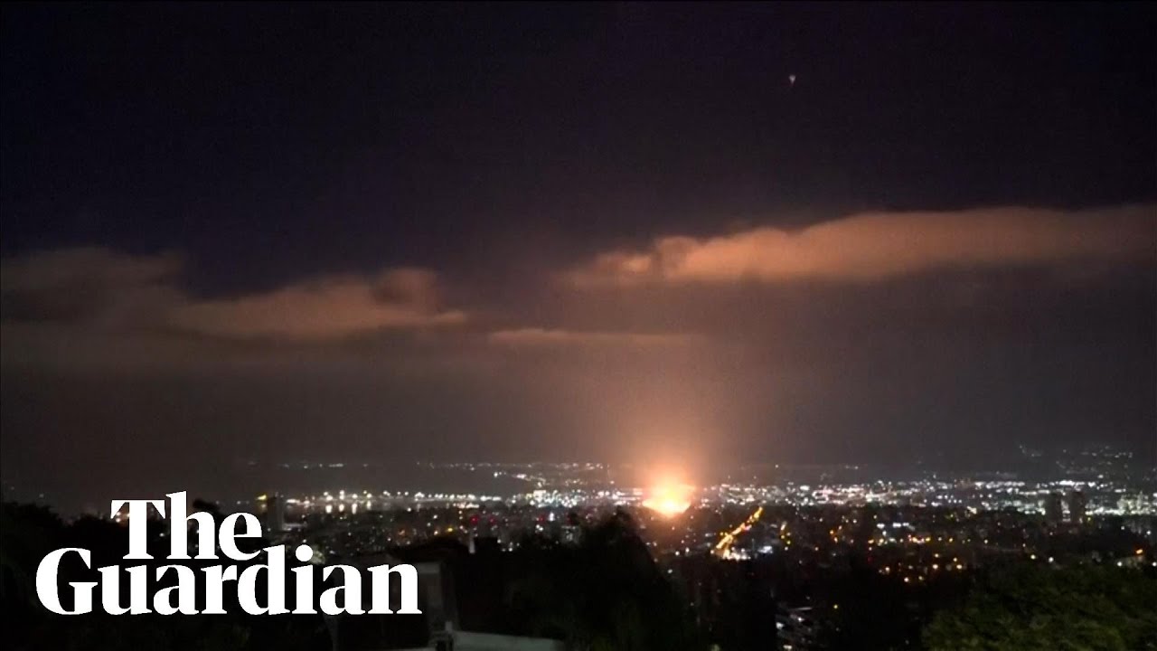 Moment apparent projectile hits Haifa in Israel on third night of conflict with Iran
