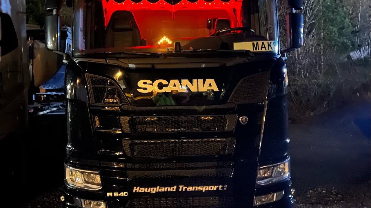Moving 20ft container with loader crane Effer and trailer