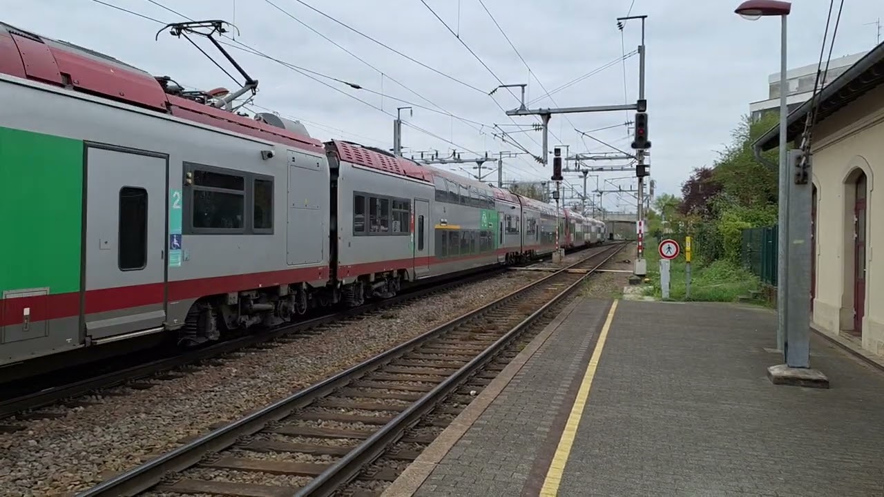 Old and new ( refurbished) 2N NG train of CFLin Bettembourg station , Luxemburg.