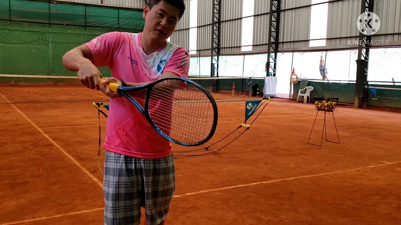 Como fazer o top spin no backhand de duas mãos