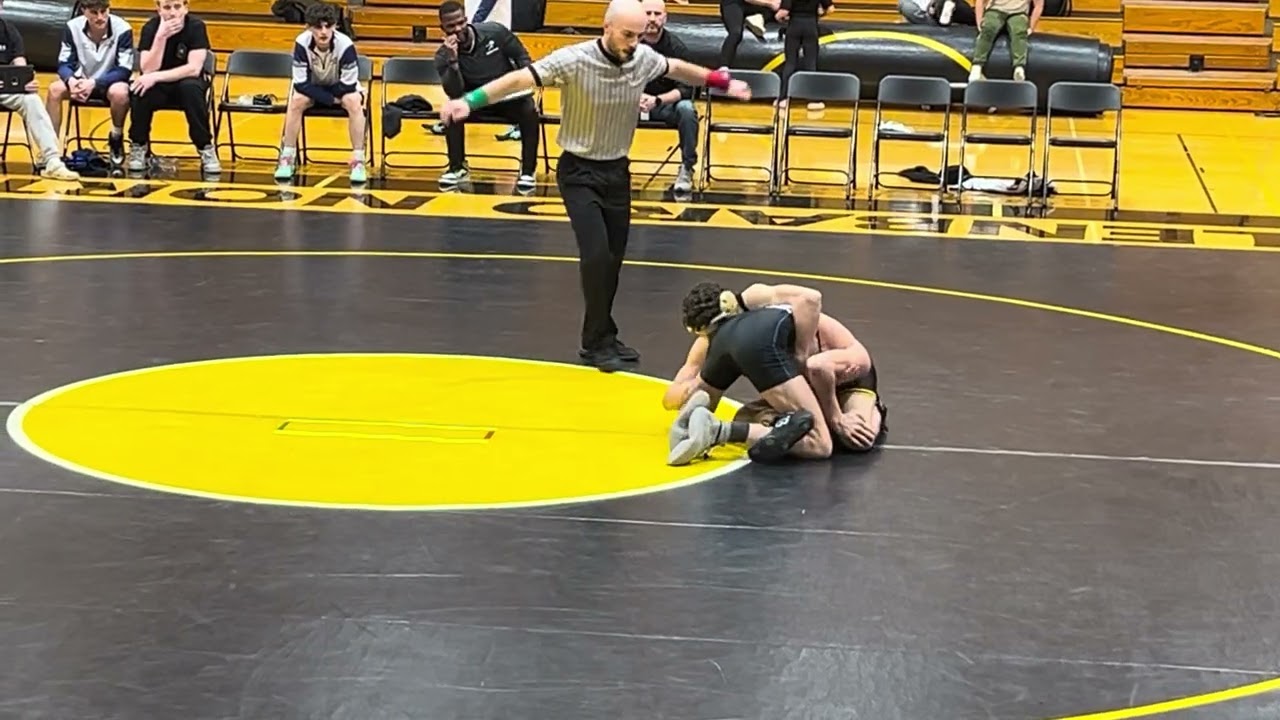 Wrestling match Glenburn North versus Saint Charles North high school