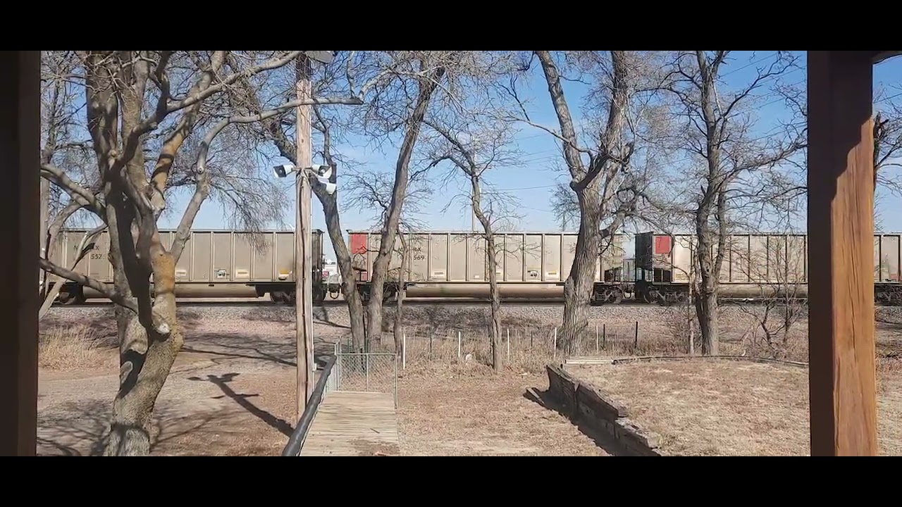 BNSF 6047 leading empty coal train with 4 dpu's 