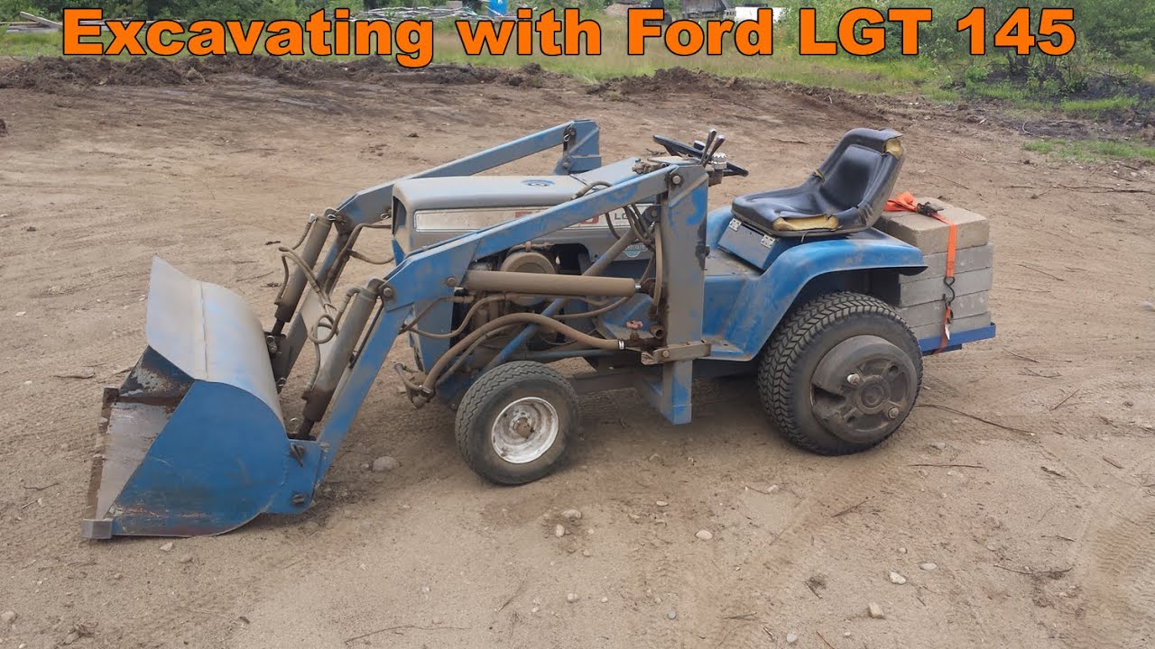 Excavating with Ford LGT 145 Garden Tractor with Front End Loader