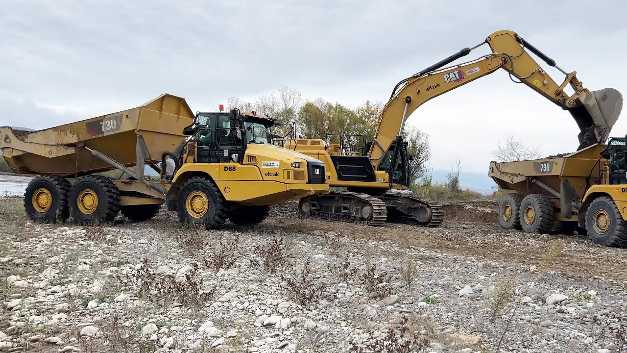 Caterpillar 352 & Caterpillar 730 Articulated Haul Trucks Working On River Bed - Interkat SA - 4K