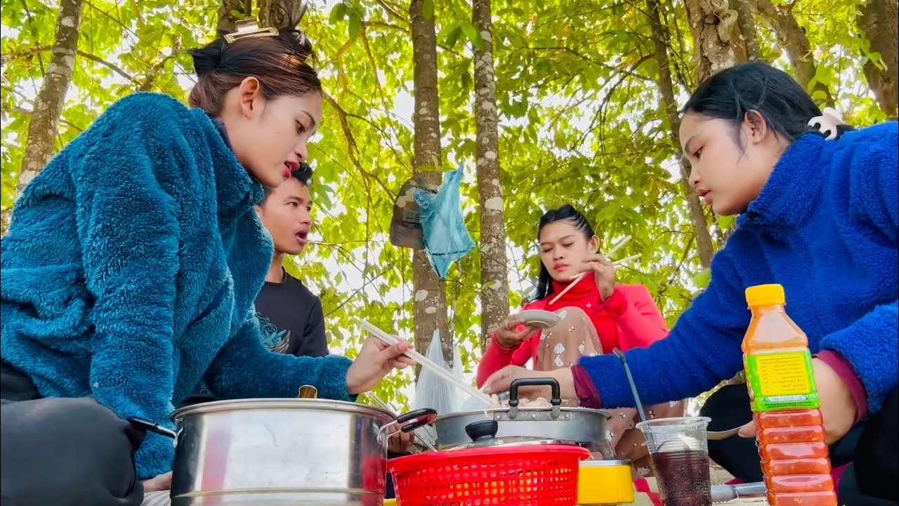 A wonderful meal of hot pot with shrimp and beef, surrounded by the peaceful rice fields