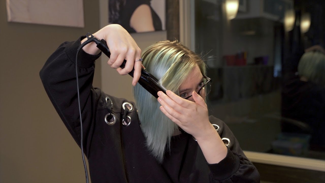 How to Style Bangs While Growing Them Out