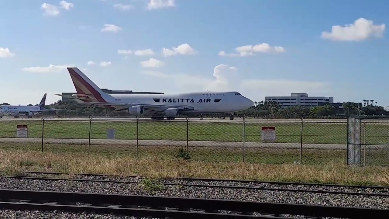 Lufthansa 747, Kalitta Air 747, and Latam Cargo 767 takeoff at Miami International Airport