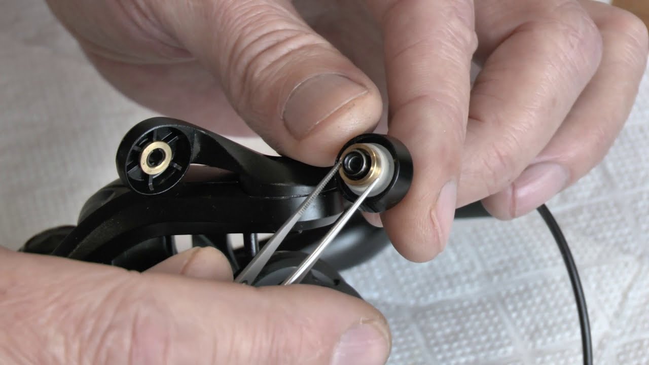 Апгрейд DAIWA EMBLEM SPOD 35 SCW QD. Установка подшипников в ролик лесоукладывателя.