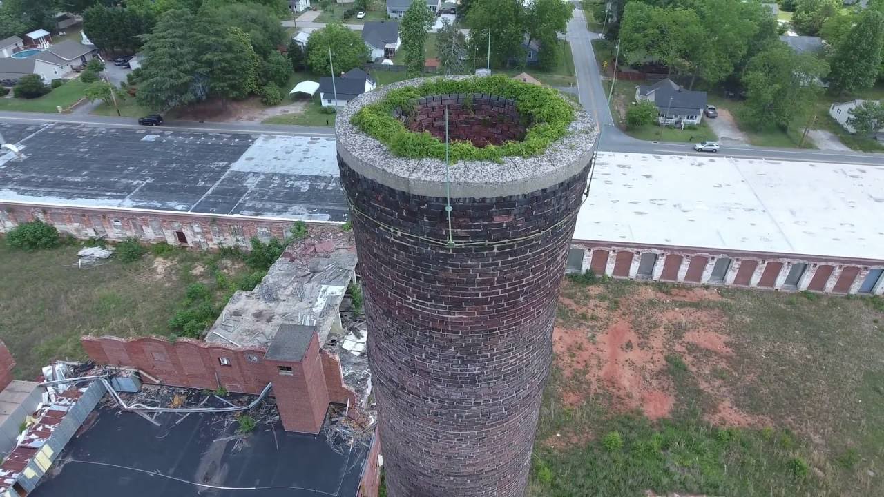 extreme closeup looking down in an old 125ft brick smoke stack