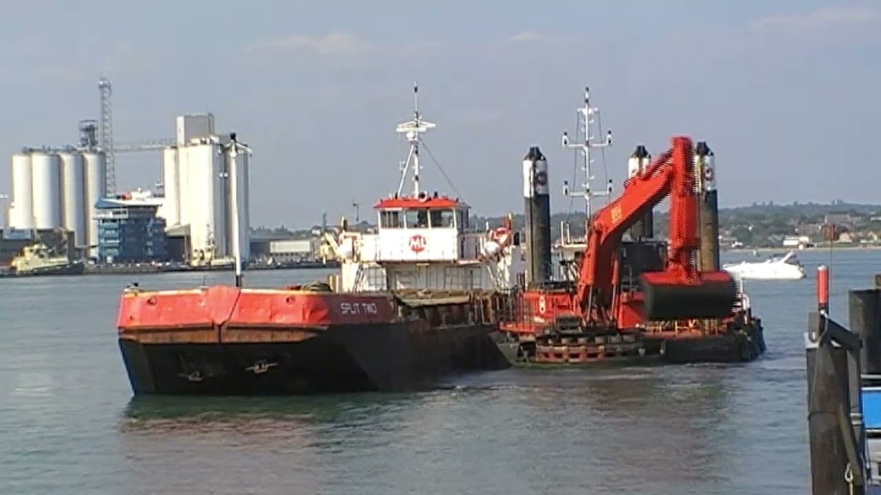 SPLIT TWO Loading dredged mud at Hythe Marina