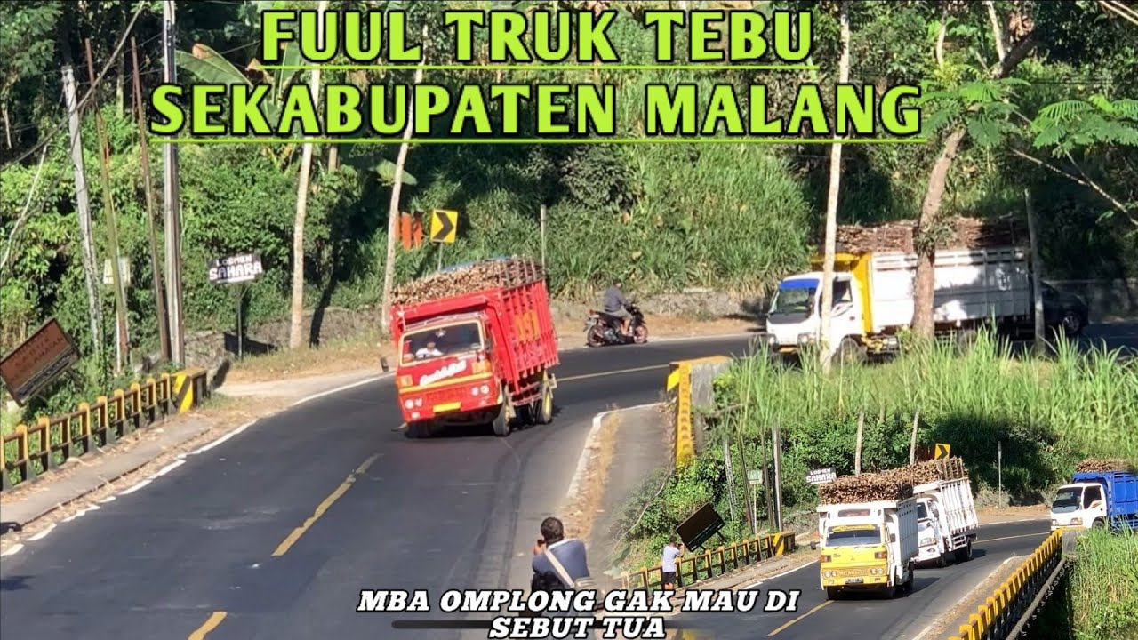 Truk omplong makin gan4s miring di tikungan jembatan lahor