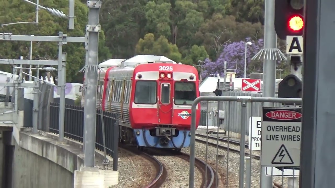 TRAINS AND TRAMS AT GOODWOOD RAILWAY STATION (PLUS TRAINS AT KILBURN) (INFO AND FACTS IN THE DESC)