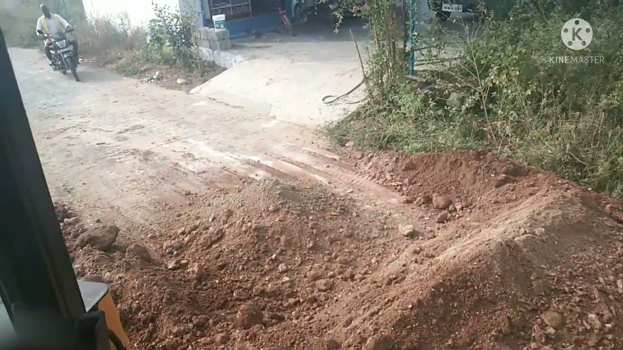 Cat 424 septic tank work and back fil breaker work