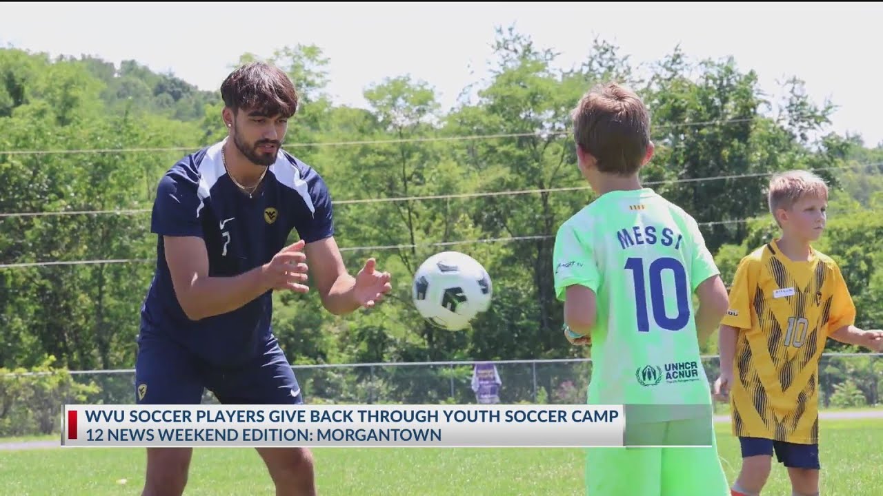 WVU soccer players coach young athletes at soccer camp