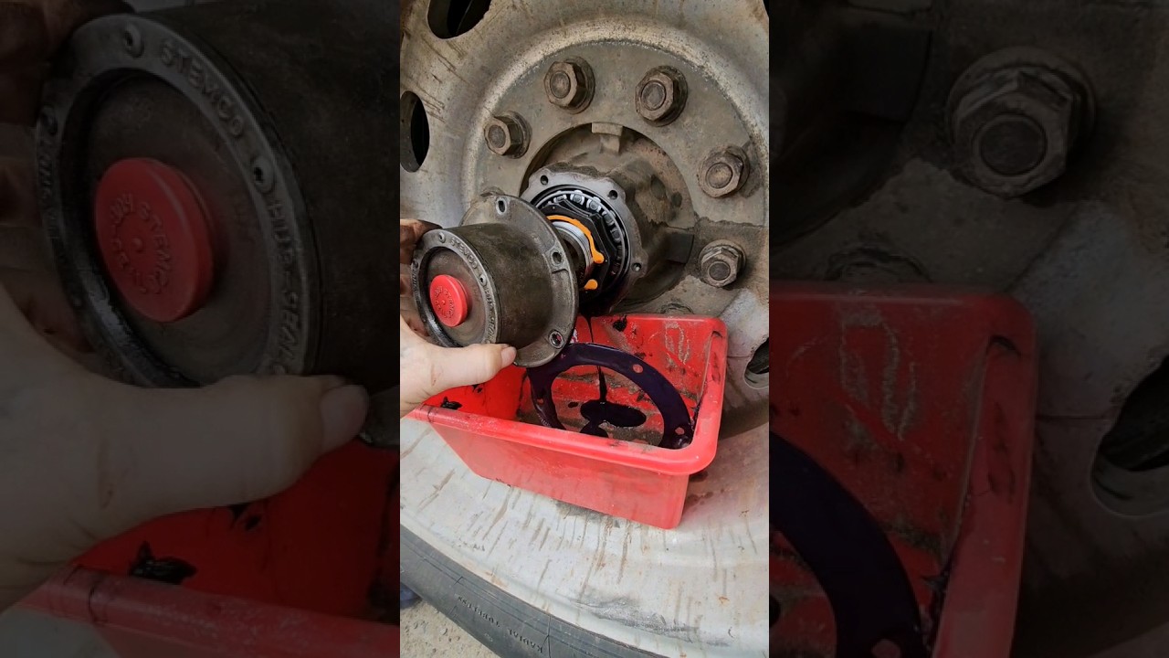 Fixing a hubcap leak on a flatbed trailer.