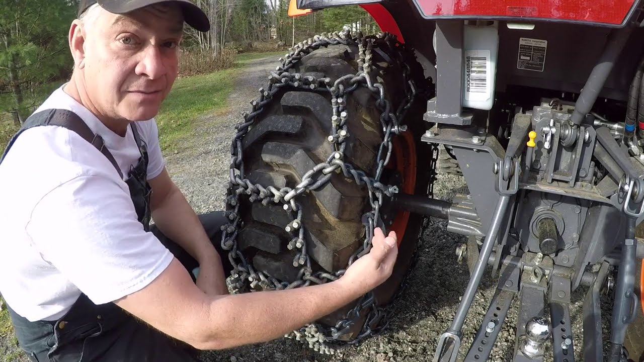 #353 Aquiline Talon Tractor Tire Chains. Installation. Kubota LX2610 compact tractor. outdoors