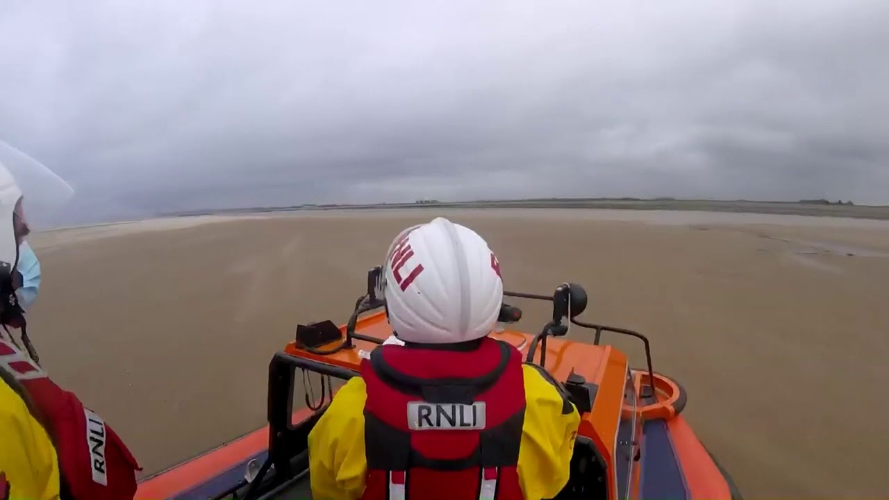 Hoylake RNLI hovercraft launches to people cut off by incoming tide in Leasowe Bay
