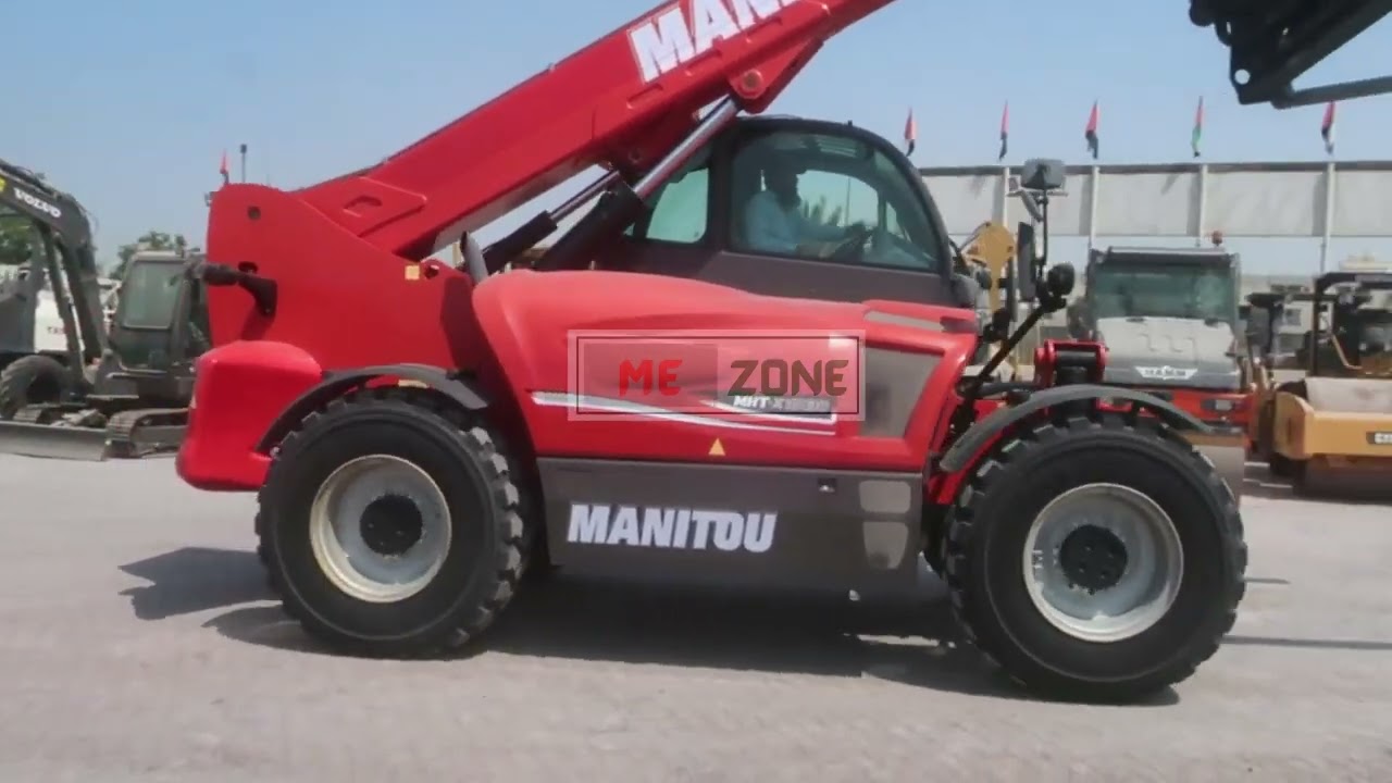WHAT A LOVELY HEAVY CONSTRUCTION EQUIPMENT!TELEHANDLER MANITOU MHT X 10130 IN OUR YARD