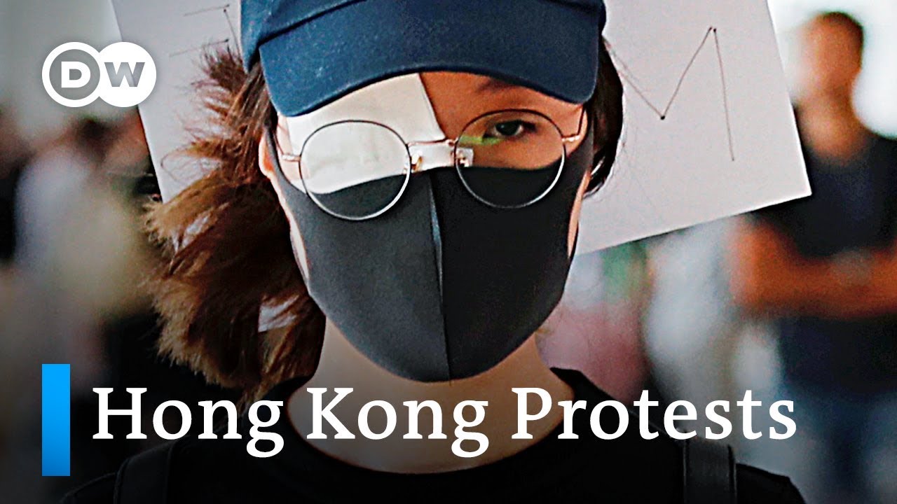 Violence ramps up as Hong Kong protesters jam airport | DW News