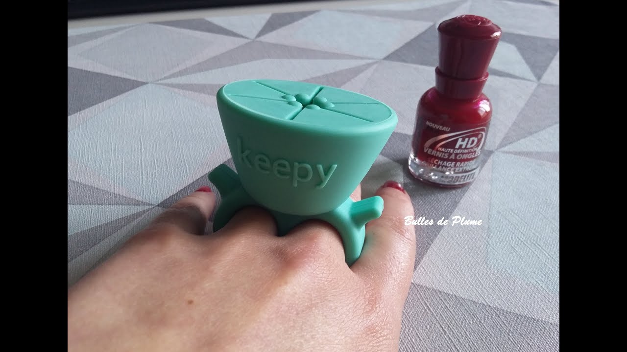 Bulles de Plume Keepy bague support vernis