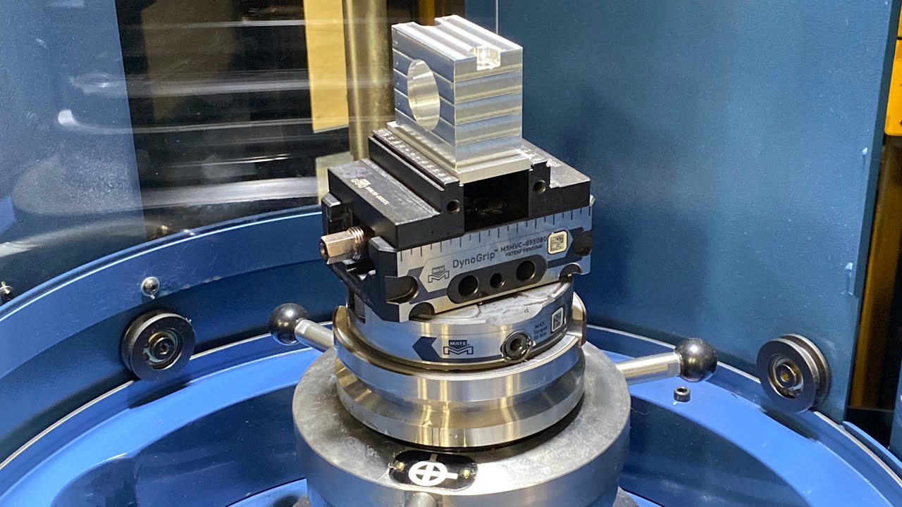 MAM72 35V first part. 5 axis deburring, probing and zero fall out holding .0003 on two diameters!