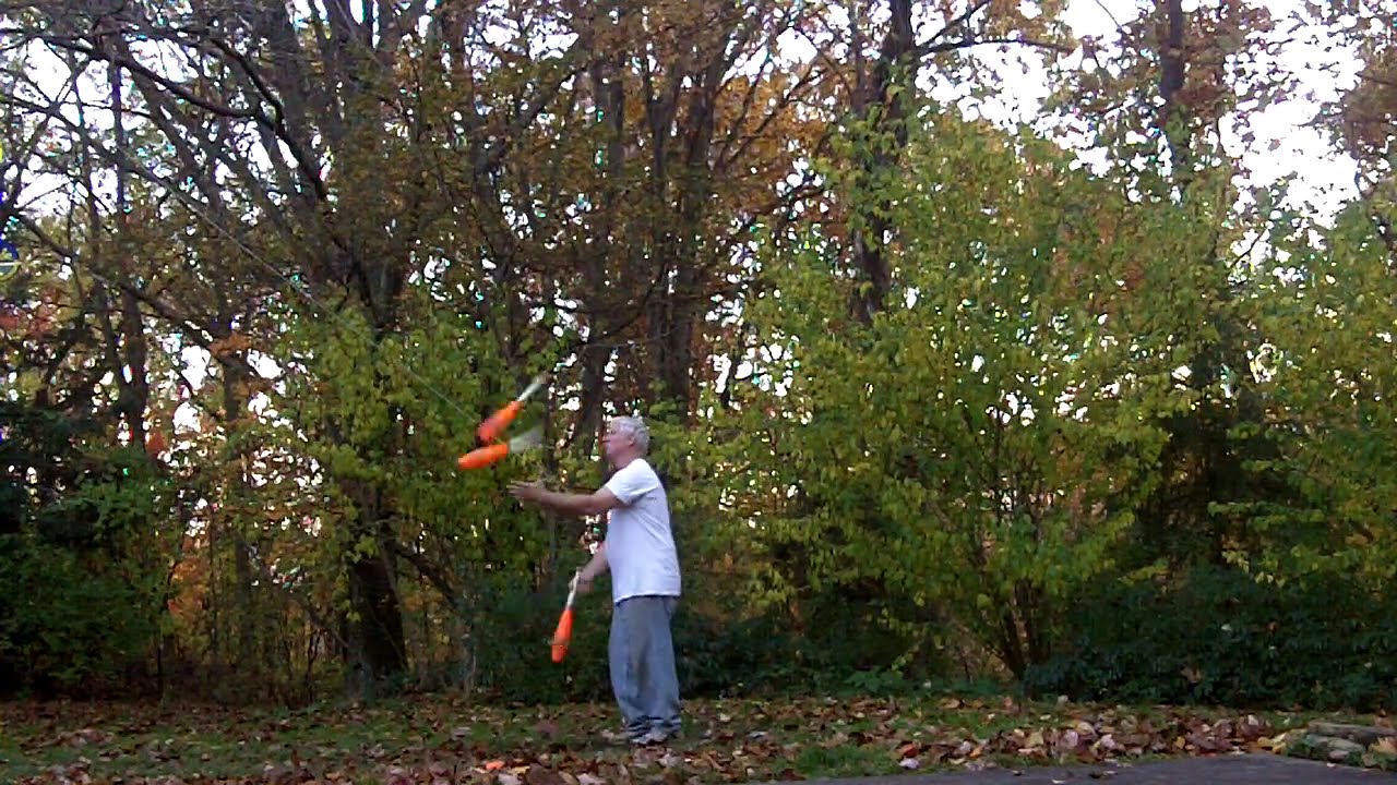 KENNY Juggling backyard practice. clubs 55011304
