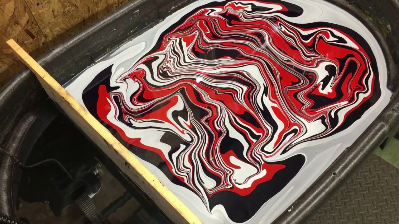 Swirling a Fender style guitar in Red, White and Blue