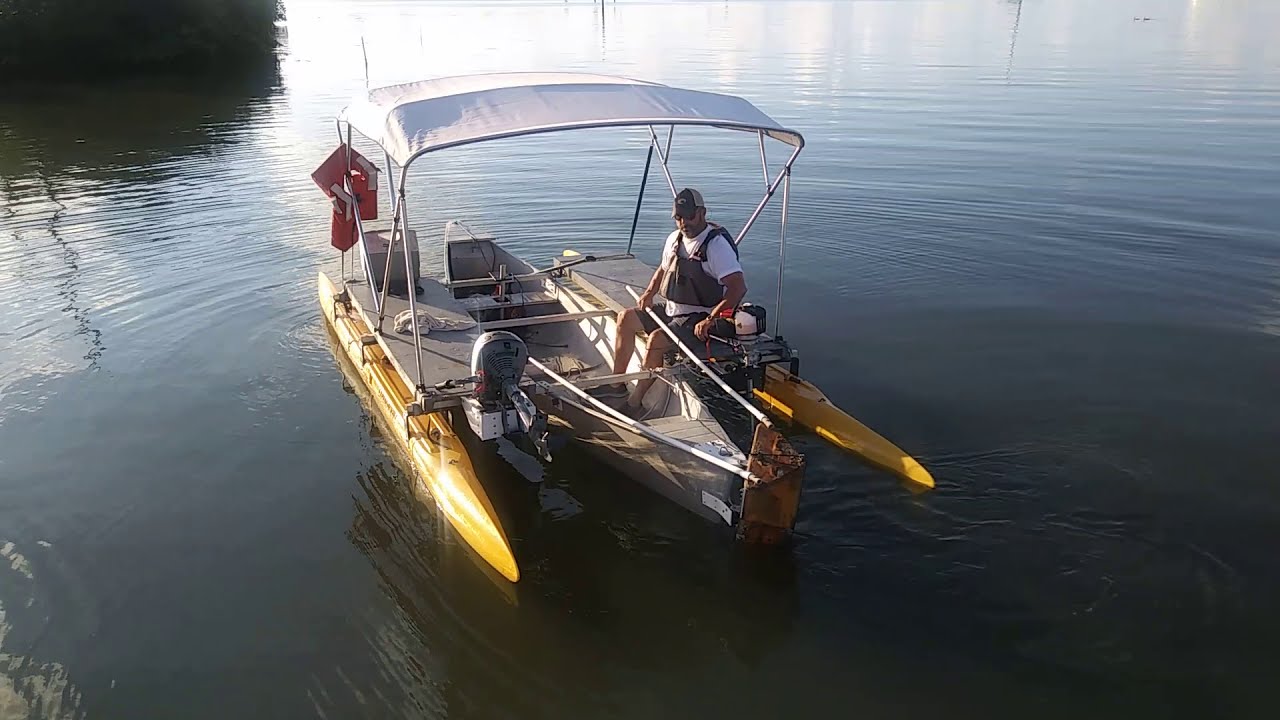 Outrigger Canoe with 1.5 HP Outboard Honda Motor.