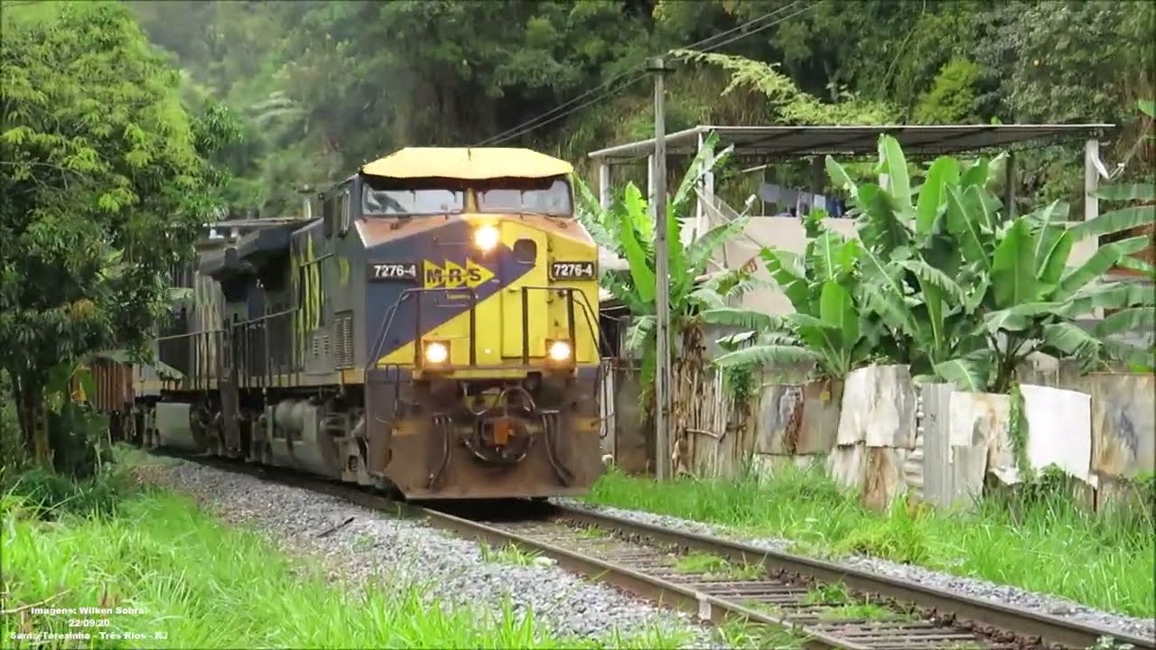 Composição de minério vazio prefixo NHE 0703 GE AC44i #7276-4 e #7238-1 com 136 vagões modelo GDT