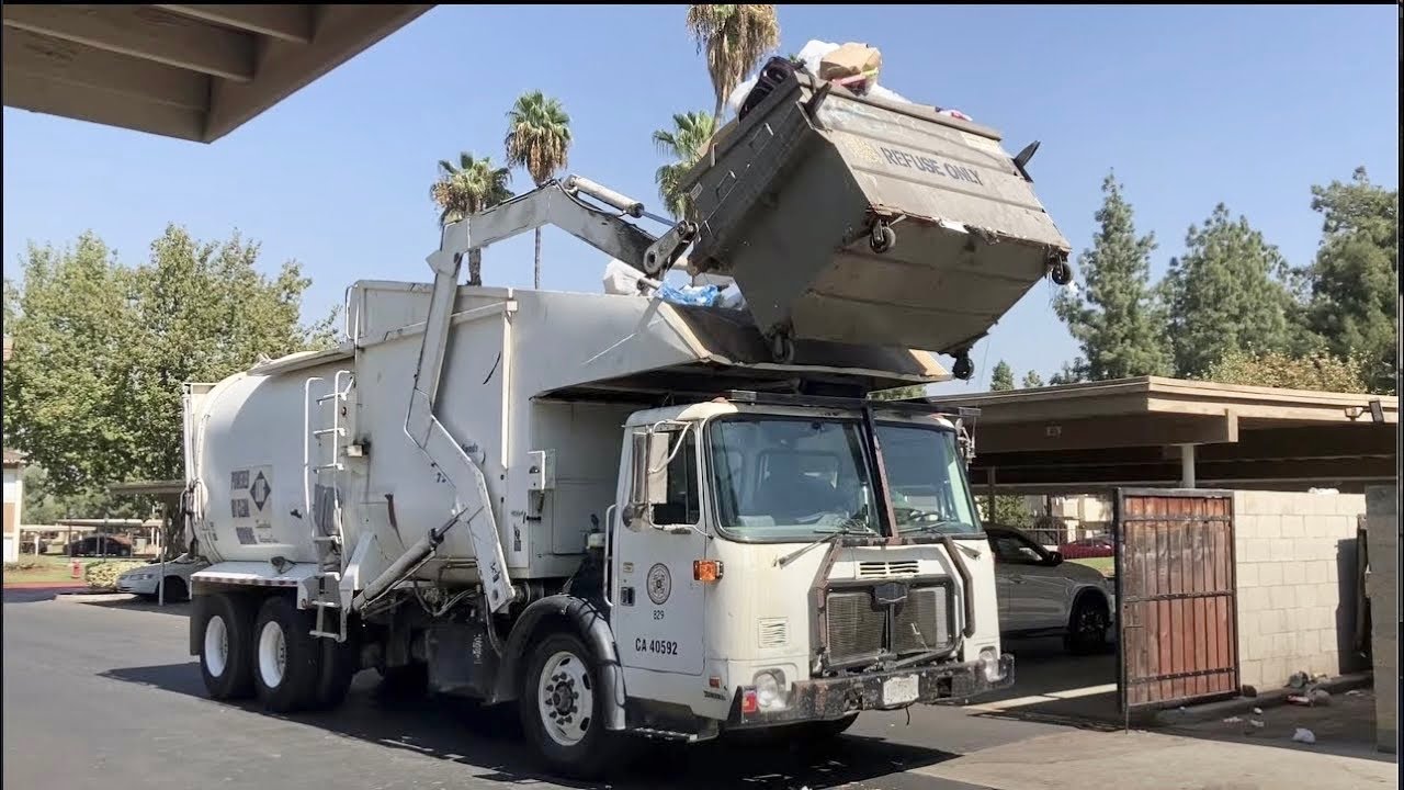 City of Redlands Autocar WXLL Amrep Hardox FL on Overfilled Dumpsters