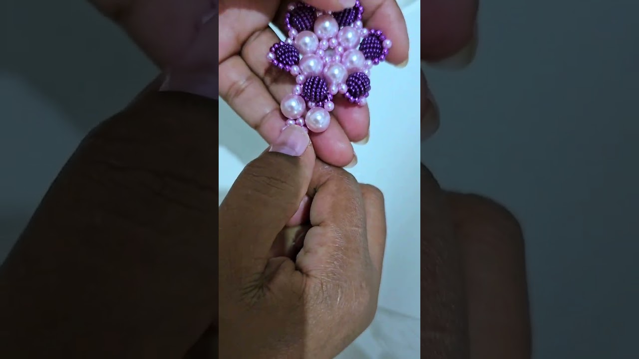 Flor dupla de pérolas