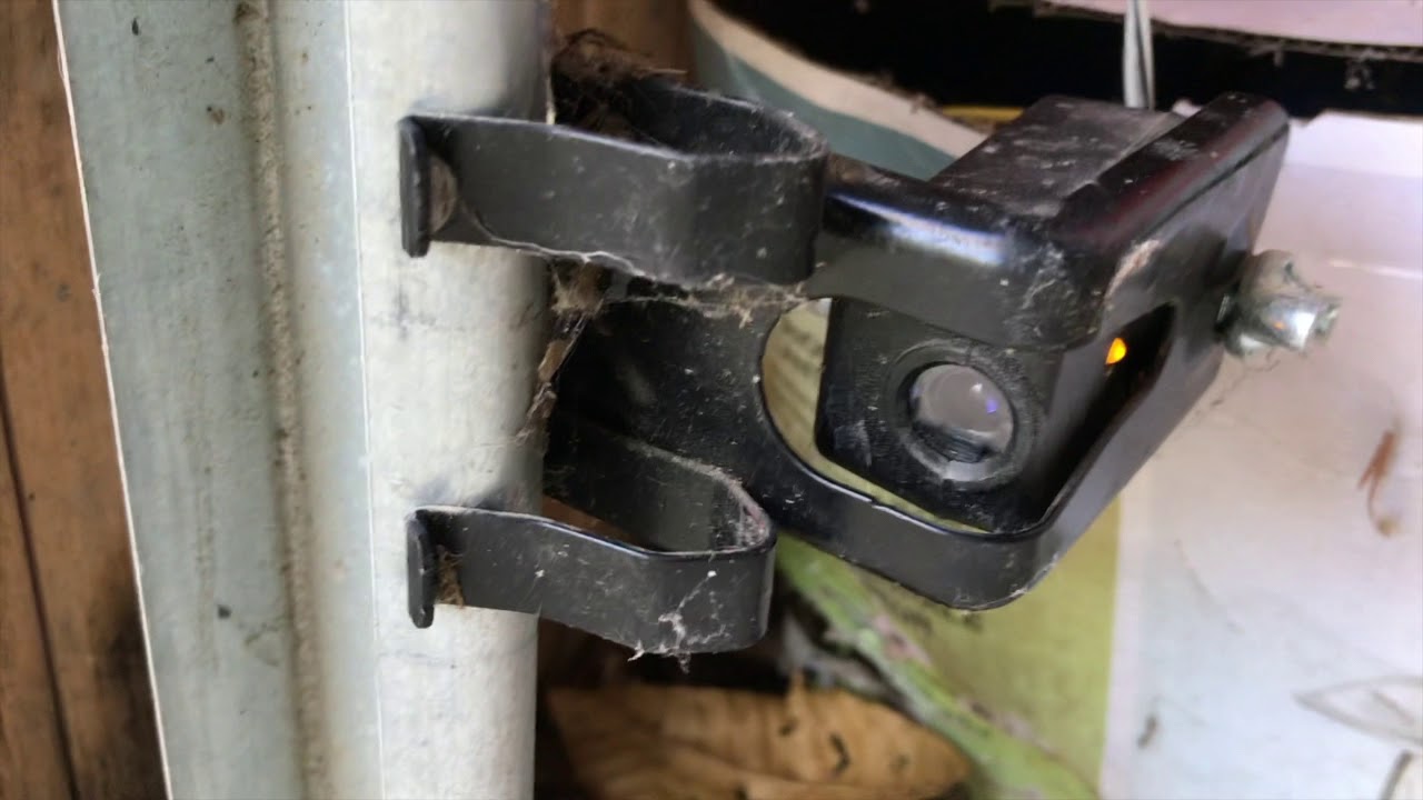 Garage Door won't close - How to align Safety Reverse Sensors - FAST & EASY!