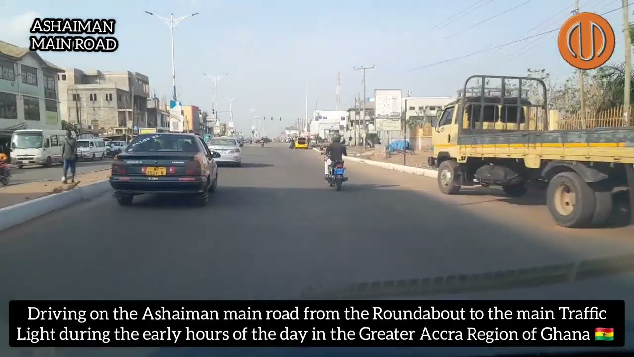 Driving on the Ashaiman main road from the Roundabout to the Main Traffic Station.