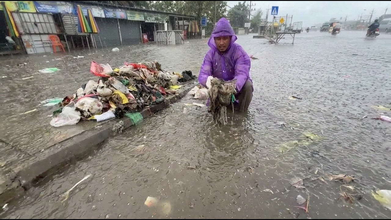 Working in Heavy Rain to Stop the Flood!