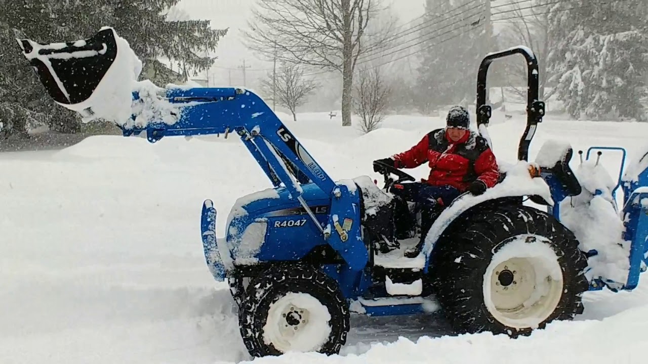LS 4047 Tractor/Loader/Hoe Clearing 2' Of Snow