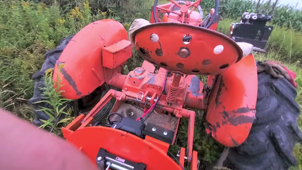 Allis Chalmers WD with snap coupler skidding winch