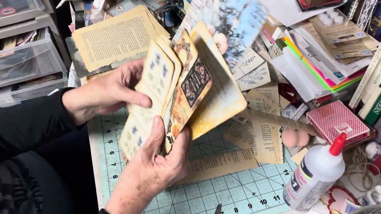 Backing scrapbook paper tags with vintage book pages!