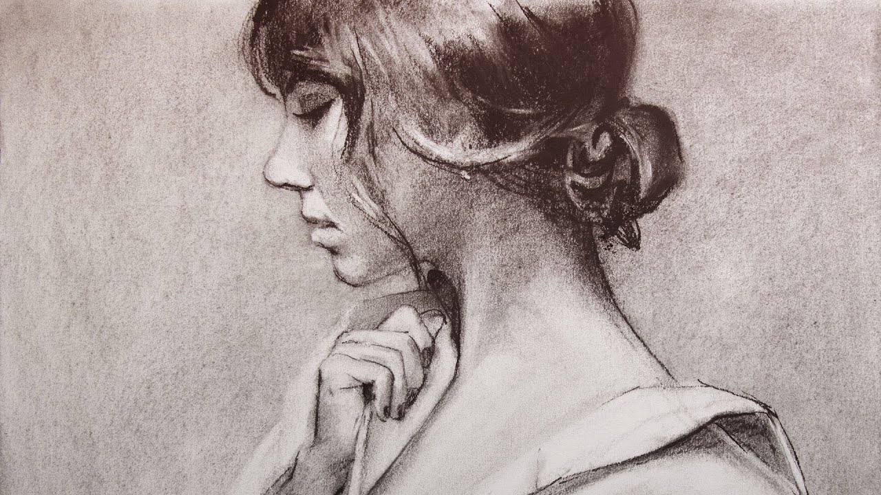 Drawing a woman with charcoals